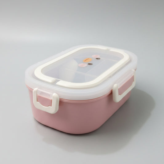 A pink plastic lunch box with a clear lid and white handle, placed on a white marble tabletop.