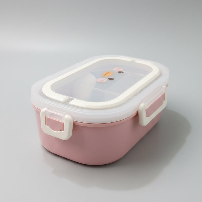 A pink plastic lunch box with a clear lid and white handle, placed on a white marble tabletop.