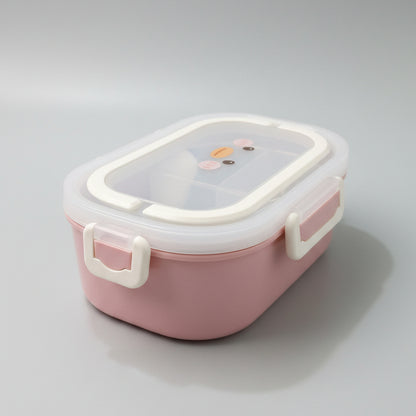 A pink plastic lunch box with a clear lid and white handle, placed on a white marble tabletop.